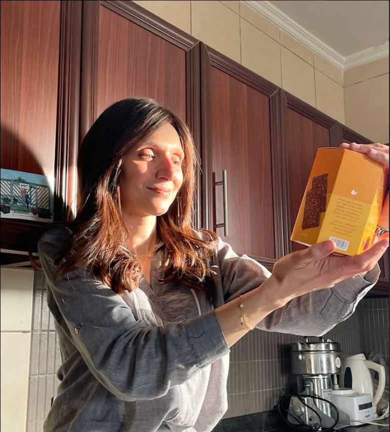 Founder holding product